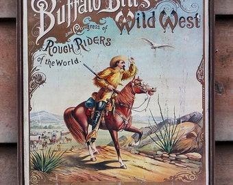 Distressed wooden sign 'Buffalo Bill's Wild West' reproduction.