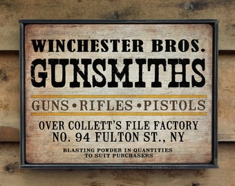 Rustic wooden sign ' Gunsmiths '