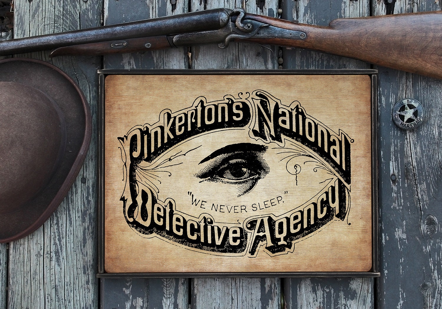 Distressed wooden sign 'Pinkerton's National Detective Agency'
