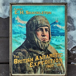 Distressed wooden sign &#39;Lieut. E.H. Shackleton&#39;. Commemorating Ernest Shackleton.