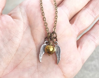 golden snitch necklace etsy