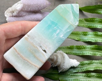Caribbean Calcite,  Caribbean Calcite Tower, Pistachio calcite, Aragonite, Blue Calcite, Calcite obelisk,  Seafoam Calcite, Caribbean Blue