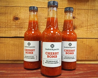 Now In Big Bottles!  10 ounce Cherry Bomb Hot Sauce Trio - Our Best Seller