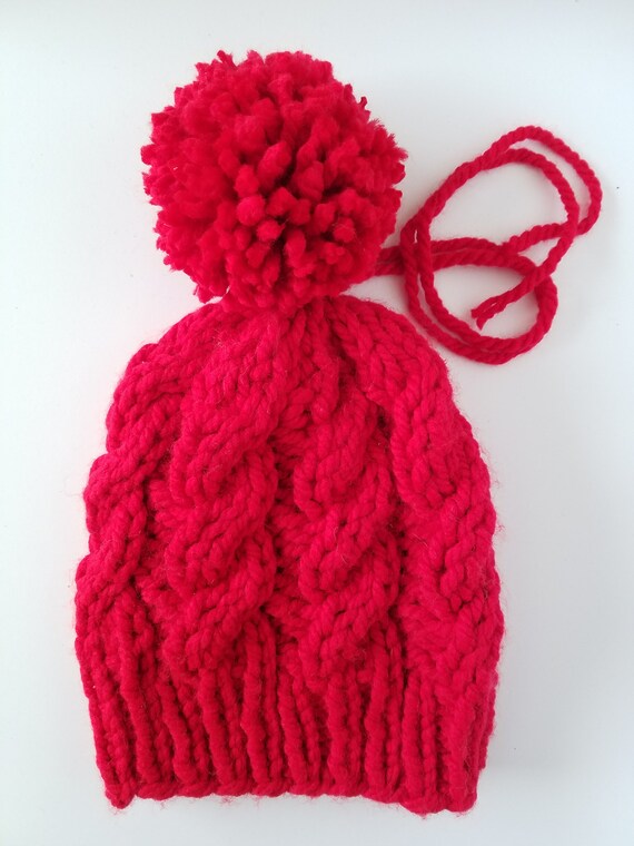 baby with red beanie