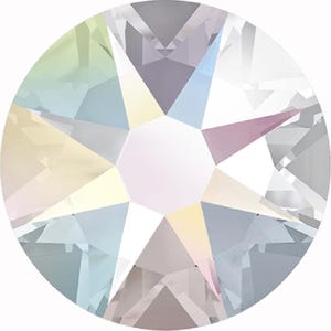 May include: A clear iridescent round crystal rhinestone with a faceted design.