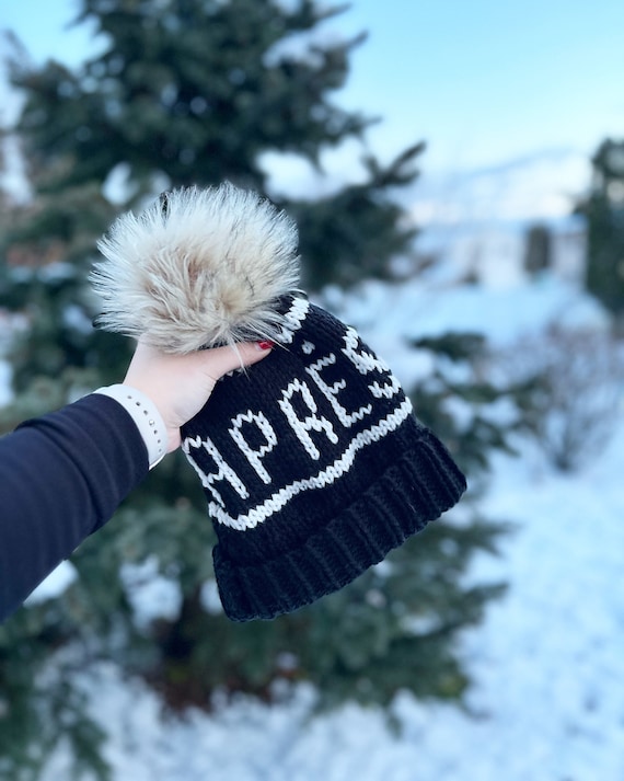 Black and white pom pom hat on sale