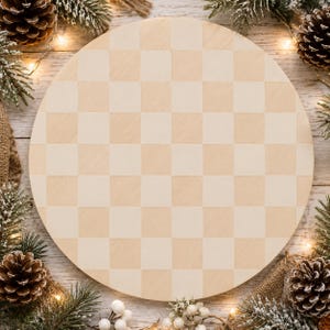 May include: A circular wooden board featuring a light and dark natural wood checkerboard pattern. The surface is flat and smooth, displaying a grid of alternating square tiles in two distinct shades of wood grain, creating a classic geometric design.