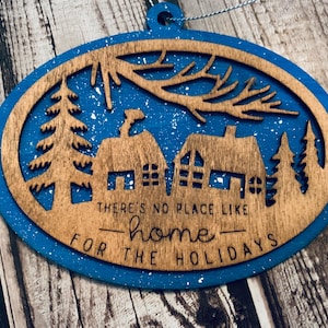Hand-Painted Wooden Christmas Ornament – Snowy Sky Over Village | Winter Scene | 4.5” x 3.5”