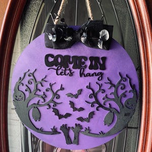 14” Halloween Door Hanger – Purple Background with Spooky Trees, Bats & Black Bow – Round Wooden Halloween Sign – Front Door Halloween Decor