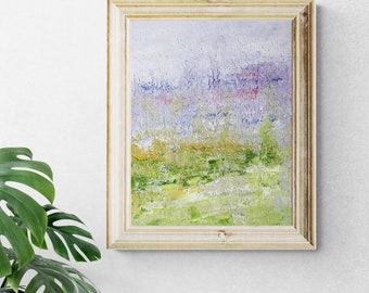May include: A framed abstract painting with a textured, brushstroke style. The painting features a landscape with shades of purple, green, and yellow.