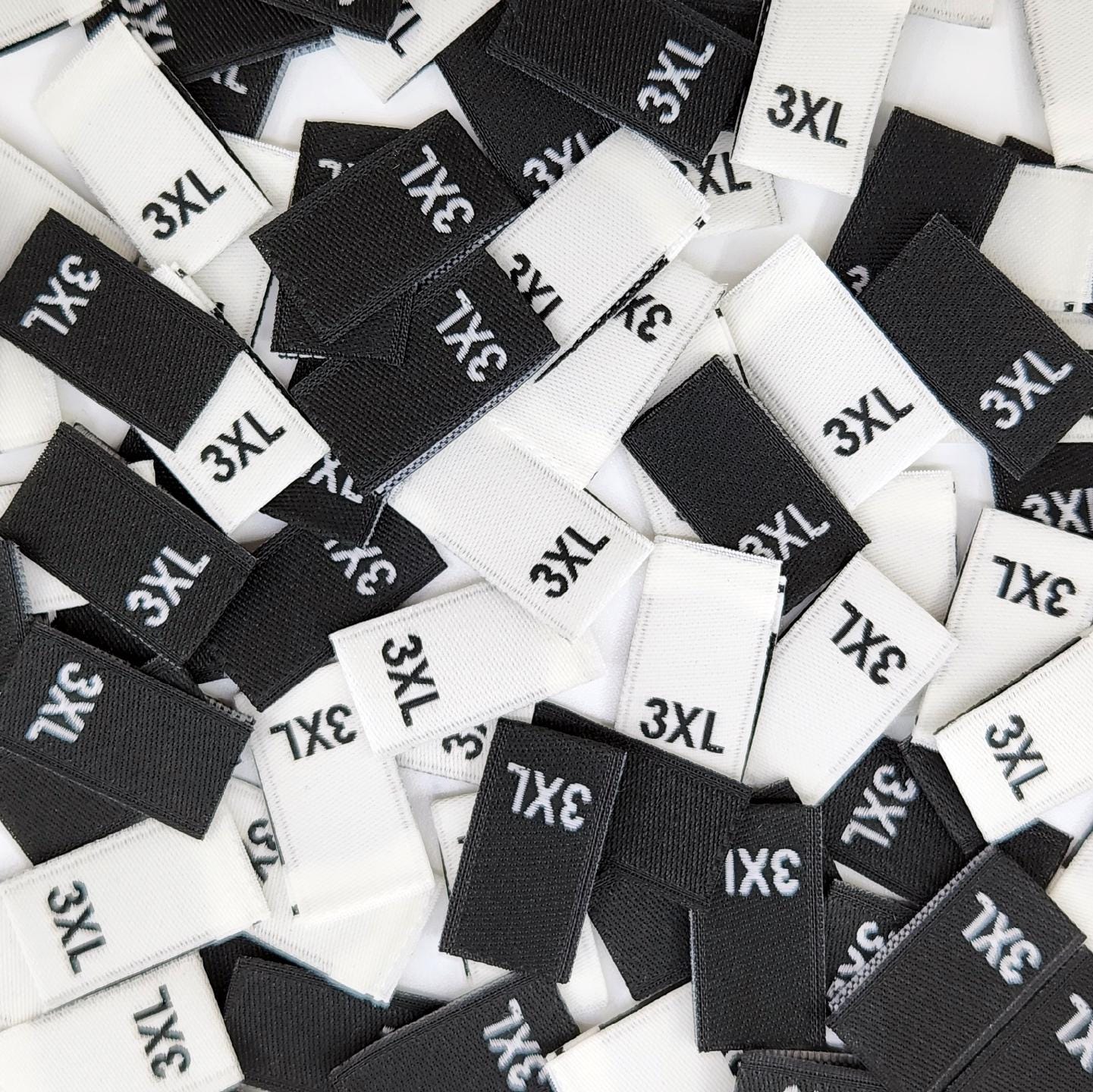 Woven Size Labels - Black With White Letter Sizes XS-XXL | Folded