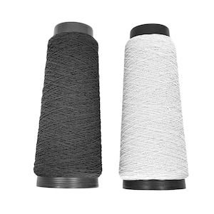 May include: Two spools of elastic thread, one black and one white. The spools are made of plastic and have a black top.