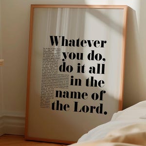 May include: A framed print with a white background and black text that reads "Whatever you do, do it all in the name of the Lord."
