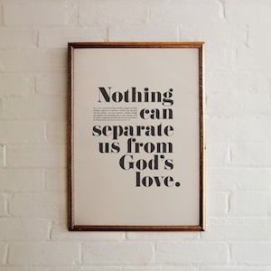 May include: A framed print with a white background and black text that reads "Nothing can separate us from God's love."