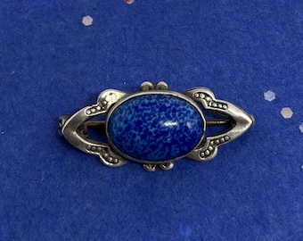 Small sterling silver art  nouveau brooch with Czech  glass cabochon in blue spatter