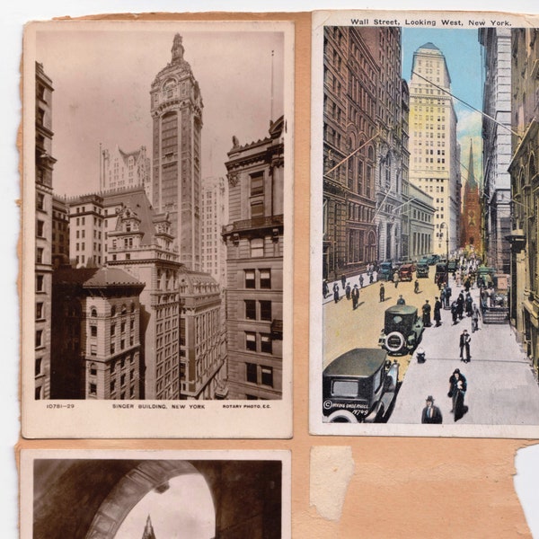 6 Picture Postcards of New York mounted on page- Ellis Island, Singer Building, Woolworths building