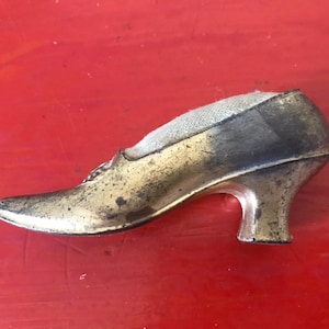1920s spelter dancing shoe pin cushion