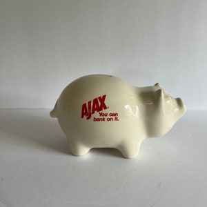 AJAX All purpose cleaner vintage 1950s promotional white ceramic piggy bank
