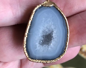 1-1/8 Inch geode pendant necklace on gold tone 18 inch chain