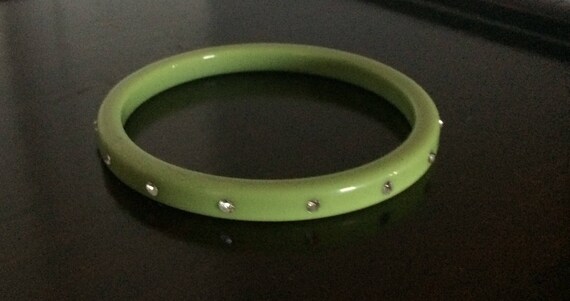 Green Bangle bracelet with embedded rhinestones - image 1
