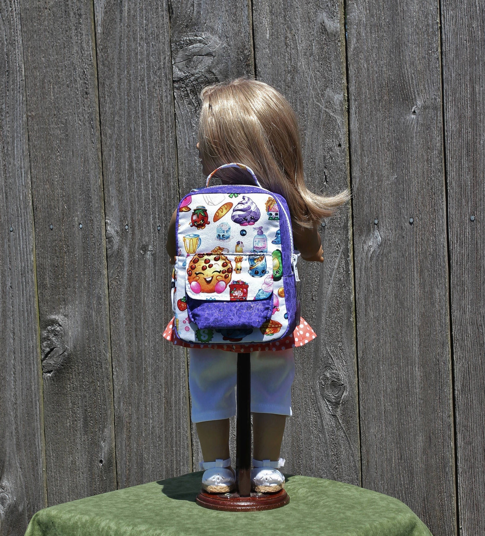 muñeca mochila