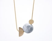 TWO MOONS // Marbled porcelain circle and bronze // necklace