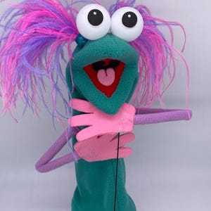 Puppet, hand and rod, with 2 feather plumes and 1 hand rod. Adult size.  |  Professional Hand Puppet. Monster Puppets Adults & professionals