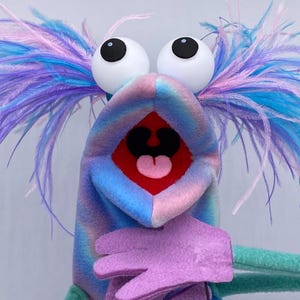 Puppet, hand and rod, with 2 feather plumes and 1 hand rod. Adult size.  |  Professional Hand Puppet. Monster Puppets Adults & professionals