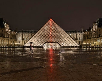 Louvre Art museum in Paris at night raining photograph, glass pyramid Woman, umbrella neon light installation, A Rainy Night at the Louvre