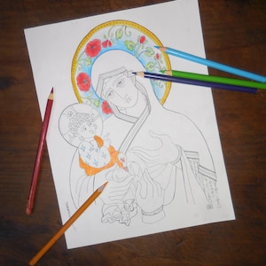 Puede incluir: Un dibujo en blanco y negro de la Virgen María sosteniendo a un bebé Jesús. El dibujo está sobre un fondo blanco y tiene un halo floral colorido alrededor de la cabeza de la Virgen María.