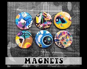 May include: Six round magnets featuring abstract art designs in vibrant colours, including yellow, blue, red, green, black, and white. The magnets are arranged in a circle on a grey textured background. The word "MAGNETS" is printed in black letters on a white background below the magnets.