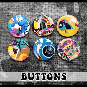 May include: Six colorful round buttons with abstract art designs. The buttons feature a variety of colors, including yellow, blue, red, black, and white. The buttons are arranged in a circle on a gray background. The word "BUTTONS" is printed in black letters on a white background below the buttons.