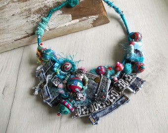 Jeans necklace with hand painted wooden beads Teal blue red colorful yarn pom pom fiber art boho statement hippie denim unique jewelry gift