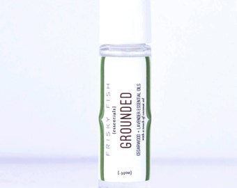 Lavande et cèdre bois huile essentielle Roller, mise à la terre est une réparatrice et terreux huile essentielle mélange mis en bouteille dans un Easy Roller