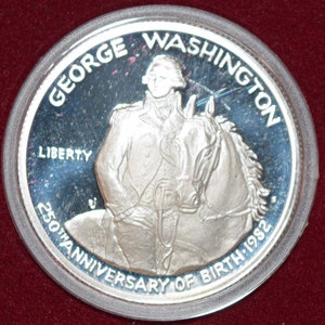 1982 Uncirculated Washington Half-Dollar, with original packaging and COA