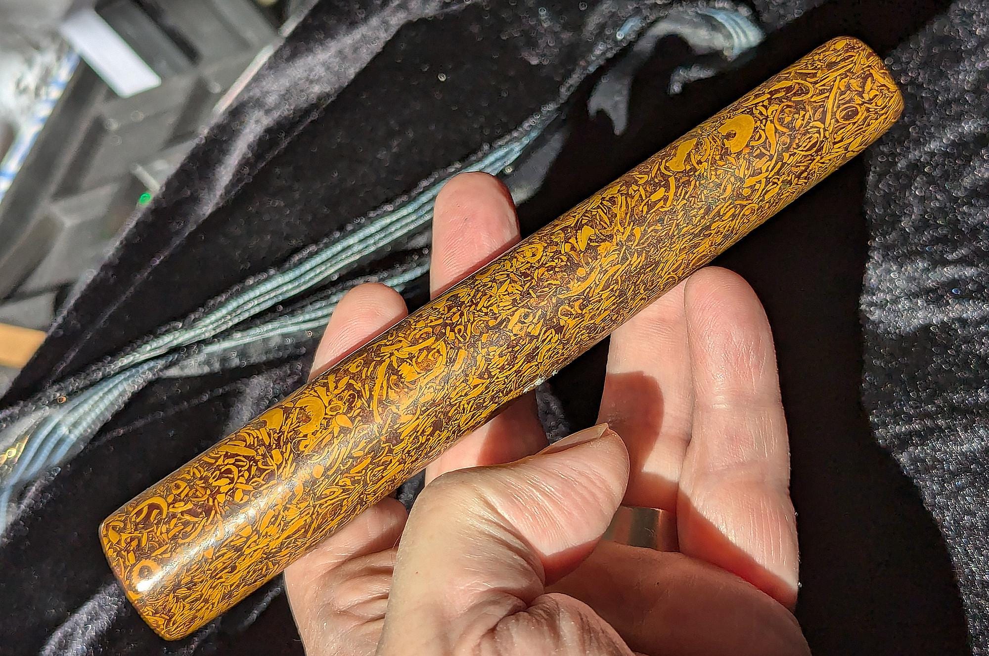 One-of-a-kind party-sized one-hitter pipe, (tube pipe) hand-carved from exotic fossil stone!