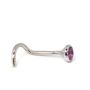 May include: A silver nose stud with a curved post and a bezel-set, round, pink gemstone. The stud is designed with a curved end for secure placement. The text "Holey Noses" is at the bottom.