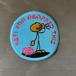 Hey you dropped this iron on patch