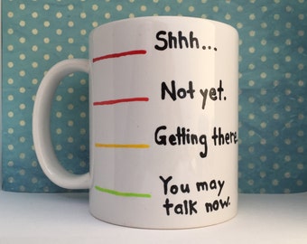 Shhh... Not yet... Getting there. You may talk now. white coffee mug