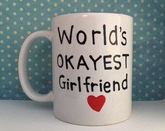 World's OKAYEST Girlfriend white coffee mug