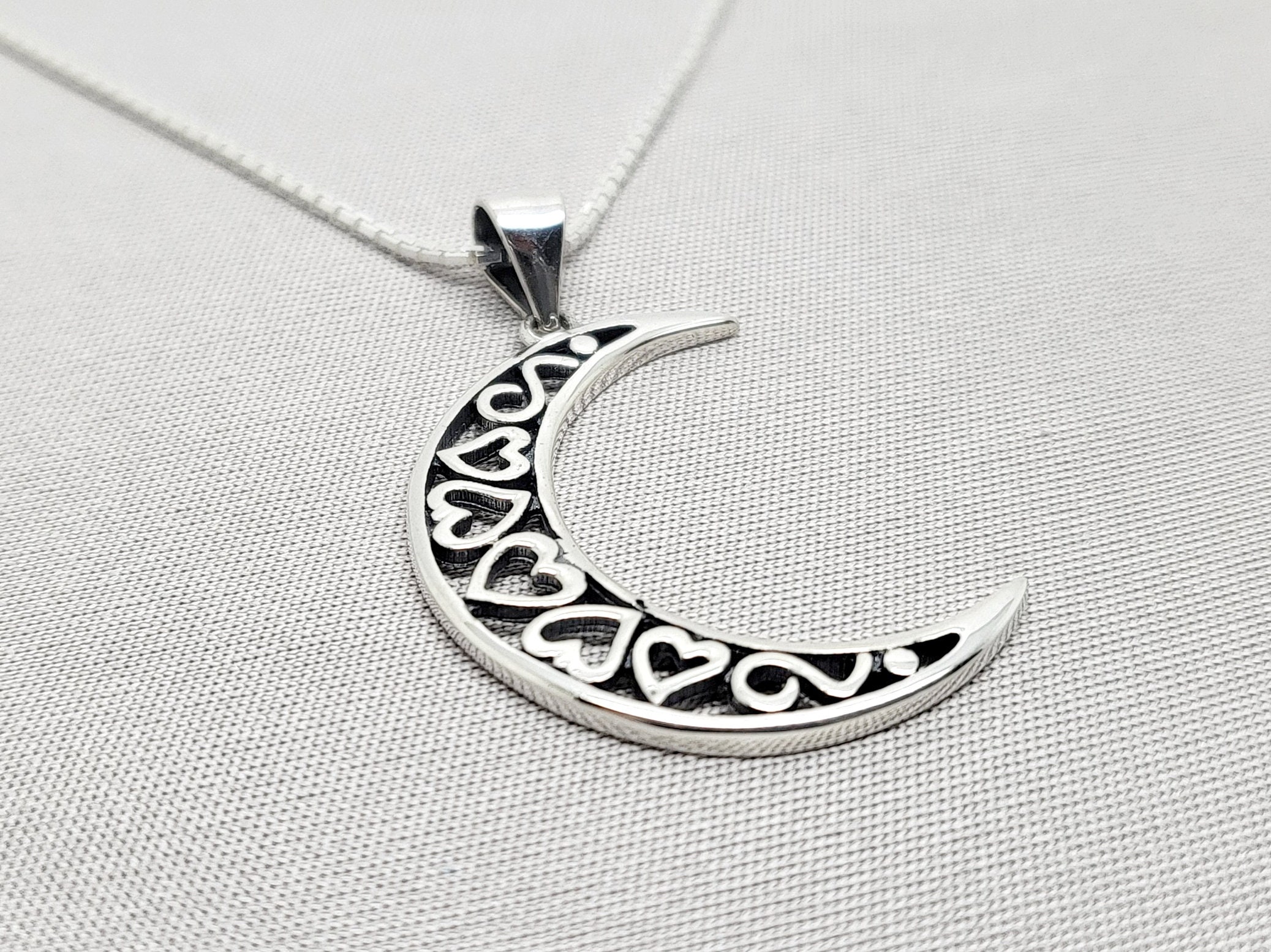 Half moon shaped necklace deals