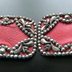Pair of Antique Steel Cut Beads and Red Leather Shoe Buckles