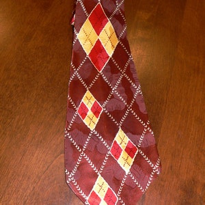 1940&#39;s wide Rayon Tie with Diamond Pattern by Wembley, Brown, Red, Yellow Cream Rayon Tie