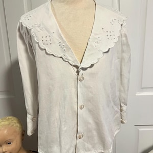 May include: A set of three ceramic mugs with a speckled, matte finish. The mugs are in shades of cream, light gray, and dark gray. Each mug has a simple, minimalist design, perfect for coffee or tea.