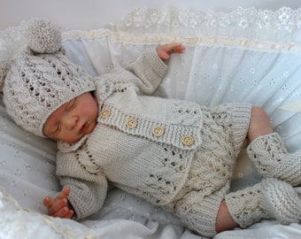 Hand knitted baby or reborn shorts, cardigan, bootees and hat. New born size or reborn approx 19-20". Unisex. Beige.