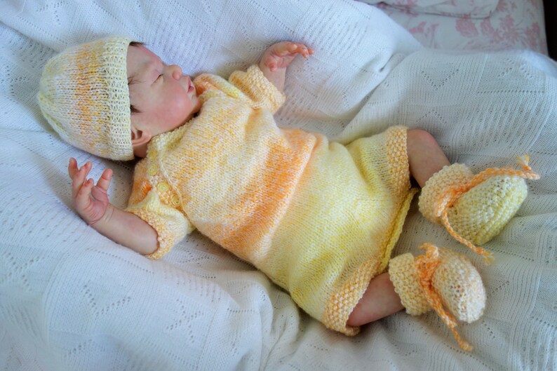 Hand knitted baby romperall-in-one knitted in soft DK in lemonorange with beanie hat and bootees to fit small baby or reborn 19-20