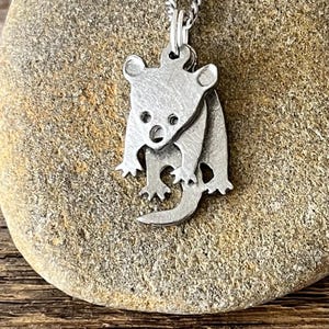 Tassie devil necklace with movement on stainless Steel chain