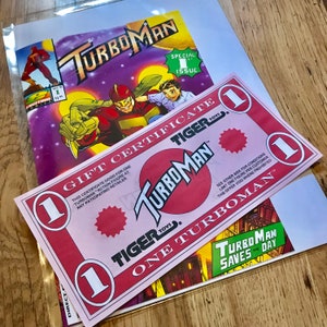Turboman Cadeaubon Replica Prop - Jingle all the Way - Christmas Stocking Filler