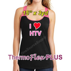 May include: A black racerback tank top with a pink and black color block design. The tank top has a pink heart with the text "I love HTV" in pink letters. The text "ThermoFlex PLUS" is printed in pink letters below the heart. The tank top is 15 inches by 3 yards.