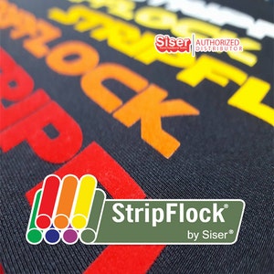 May include: Close-up of a black fabric with colorful, raised lettering that reads "StripFlock" by "Siser" in a green rectangle. The lettering is in a rainbow of colors, including red, orange, yellow, green, blue, and purple. The text "AUTHORIZED DISTRIBUTOR" is in white lettering above the green rectangle.